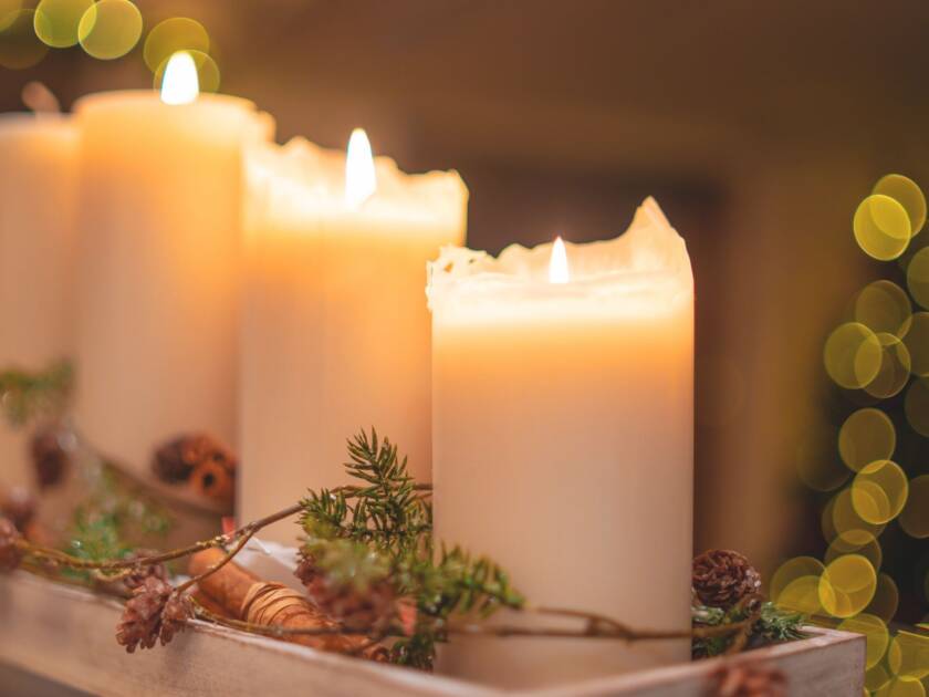 Four lighted candles.