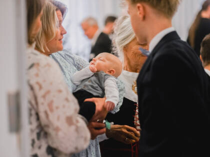 People at a baptism.